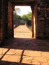 Yet another doorway and the village of ruins beyond.
